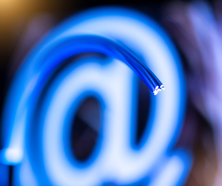 Fiber optics background with email signs