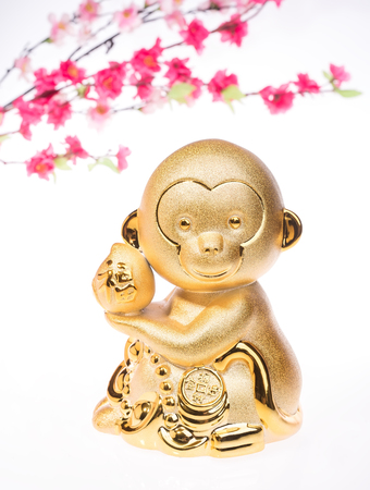 2016 is year of the monkey,golden monkey with decoration,calligraphy fu mean good blessの写真素材