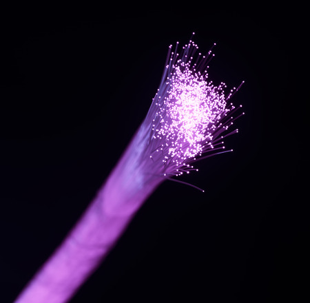 optical fibres dinamic flying from deep on technology backgroundの写真素材