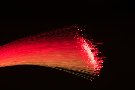 Fiber optics close-up, modern computer communication technologyの写真素材