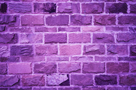 abstract purple rough grunge brick wall backgroundの写真素材