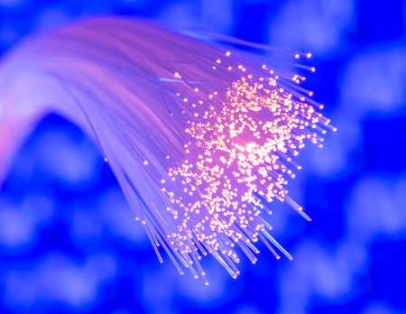optical fibres dinamic flying from deep on technology backgroundの写真素材