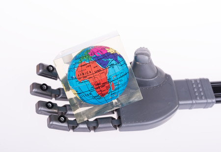robotic mechanical arm with globeの写真素材