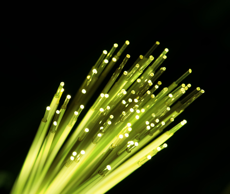 optical fibres dinamic flying from deep on technology backgroundの写真素材