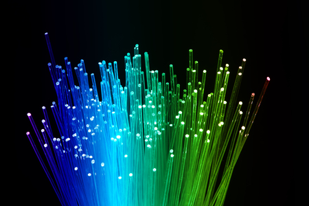 optical fibres dinamic flying from deep on technology backgroundの写真素材