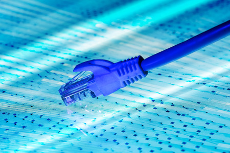 network cable with high tech technology color backgroundの写真素材