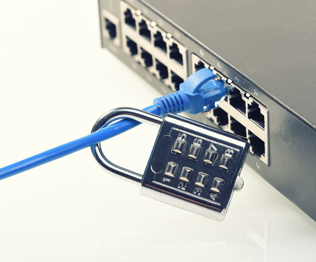 network and data protection concept with padlock and switch