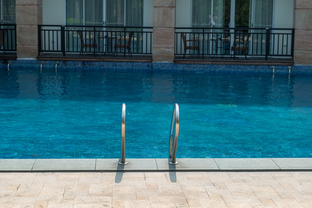staircase leading to swimming pool