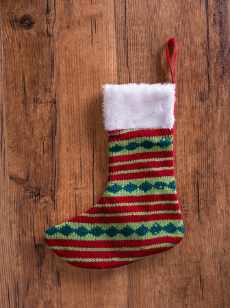 Christmas sock with on wooden background