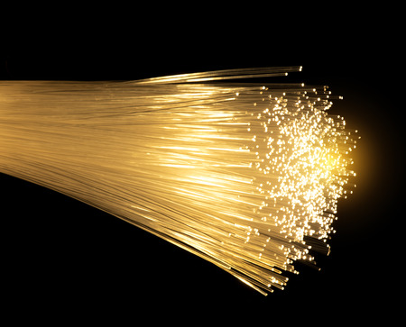 optical fibres dinamic flying from deep on technology backgroundの写真素材