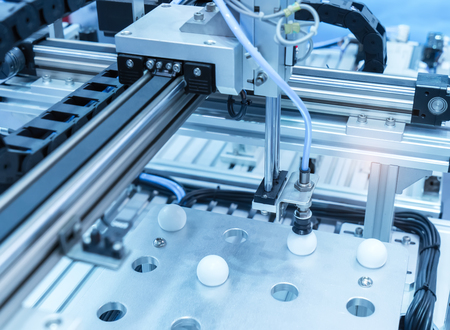 robotic arm machine tool at industrial manufacture plant,Smart factory industry concept.