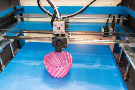 3D printer printing figure close-up macro