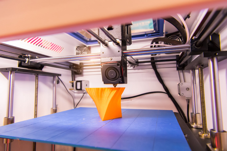 3D printer printing figure close-up macro