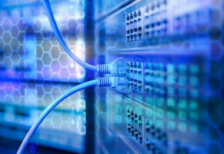 Network cables in switch and firewall in cloud computing data center server rack