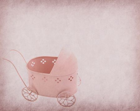 Vintage buggy on old paper backgroundの写真素材