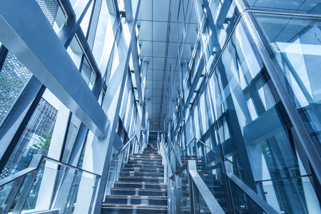 stairway of modern office building, blue toned images.のeditorial素材