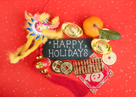 happy Holiday written on Chinese new year ornament backgroundの写真素材