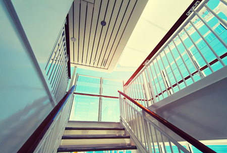stairs up on sundeck of the luxury yacht on sunny dayの写真素材