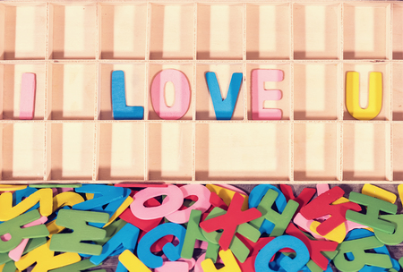 love spell with Wooden alphabet blocksの写真素材