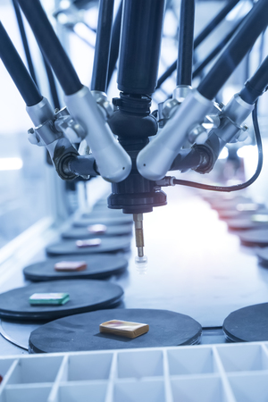 robotic pneumatic piston sucker unit on industrial machine,automation compressed air factory...