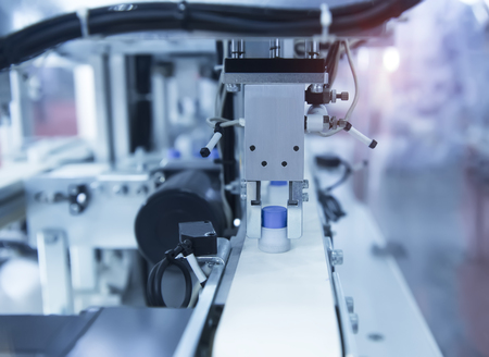 Automatic robot in assembly line working in factory. Smart factory industry concept