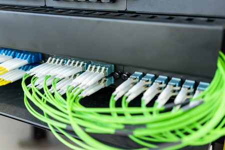 fiber optic telecommunication equipment and patchcords inside a network infrastructure