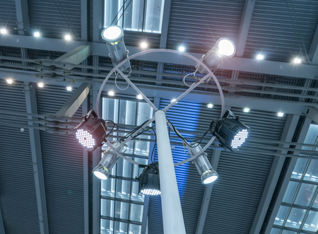 spotlights on a theatre stage lighting rig for consertの写真素材