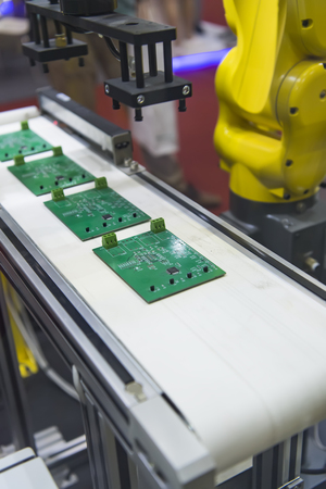 automated manufacturing soldering and assembly pcb boardのeditorial素材