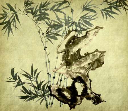Traditional Chinese-style bamboo painting on old paper backgroundの写真素材