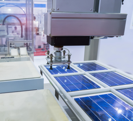 production of solar panels, Industrial robot working in factory,Conveyor Tracking Controler of...