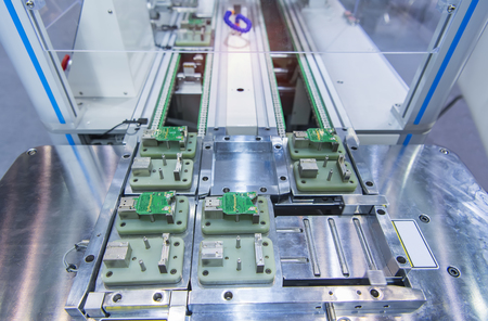 PCB Processing on CNC machine working in factory