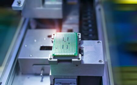 PCB Processing on machine working in factoryの写真素材