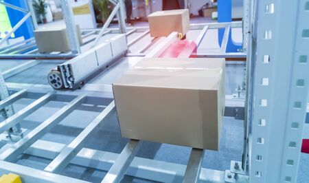 boxes in the cells of the automated warehouse. Metal construction warehouse shelvingの写真素材