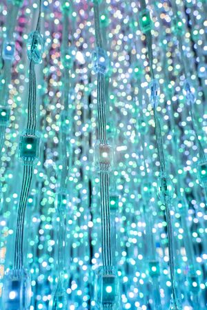 multicolored city led lights beams in motionの写真素材