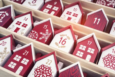 handmade wooden perpetual calendar in a form of a houseの写真素材