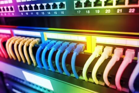 network cable connecting on network core switch close up