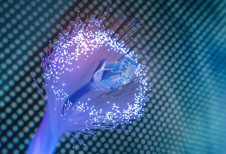 network cables with fiber optical backgroundの写真素材