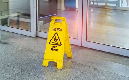 Caution wet floor sign in mall