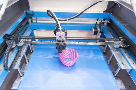 3D printer or additive manufacturing and robotic automation technology.