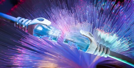 network cables with fiber optical technology background,Communication Concept