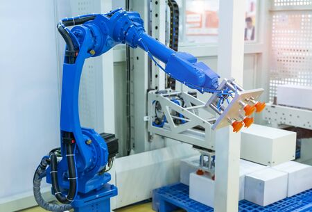 robotic pneumatic piston sucker unit on industrial machine,automation compressed air factory productionの写真素材