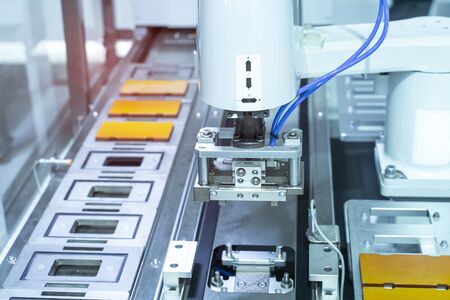 Industrial robot with conveyor in manufacture factory,Smart factory industry 4.0 concept.