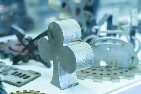 The casting iron parts in the light blue scene. The products of die casting process.