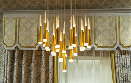 modern lamps are hanging on the ceiling. interior