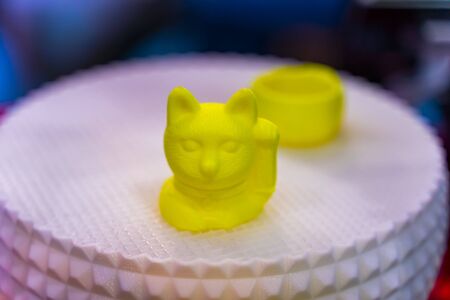 3D printer printing cat figure close-up.の写真素材