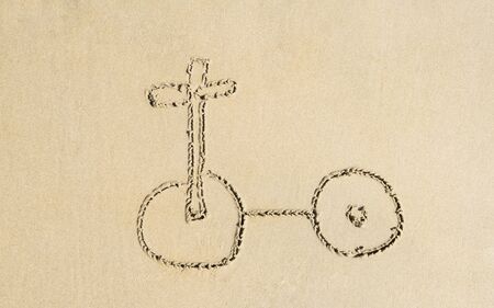 simple drawing in the sand on the beach of scooter