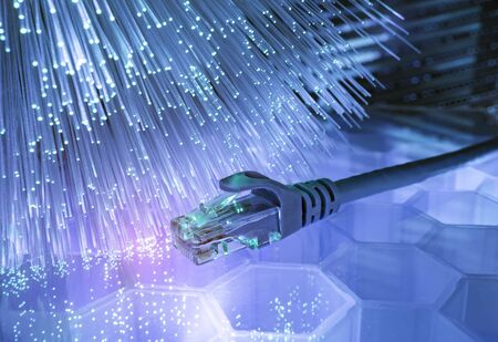 network cables with fiber optical technology background,Communication Concept