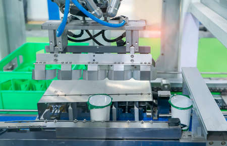 Industrial yoghurt packaging line in milk plant