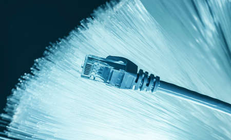network cable with high tech technology color backgroundの写真素材