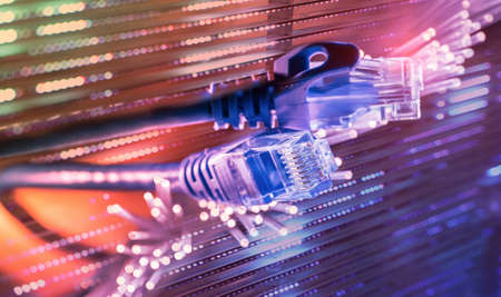 network cables with fiber optical backgroundの写真素材